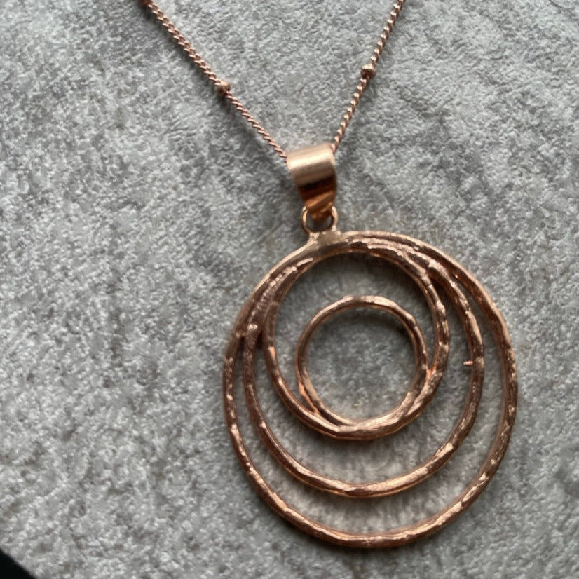 Discover Vintage Simplicity with Merald Curio's Spiral Design Necklace - SWIRL - Merald Curio